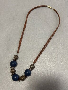Artisan-Inspired Brown Cord Necklace with Navy Beads